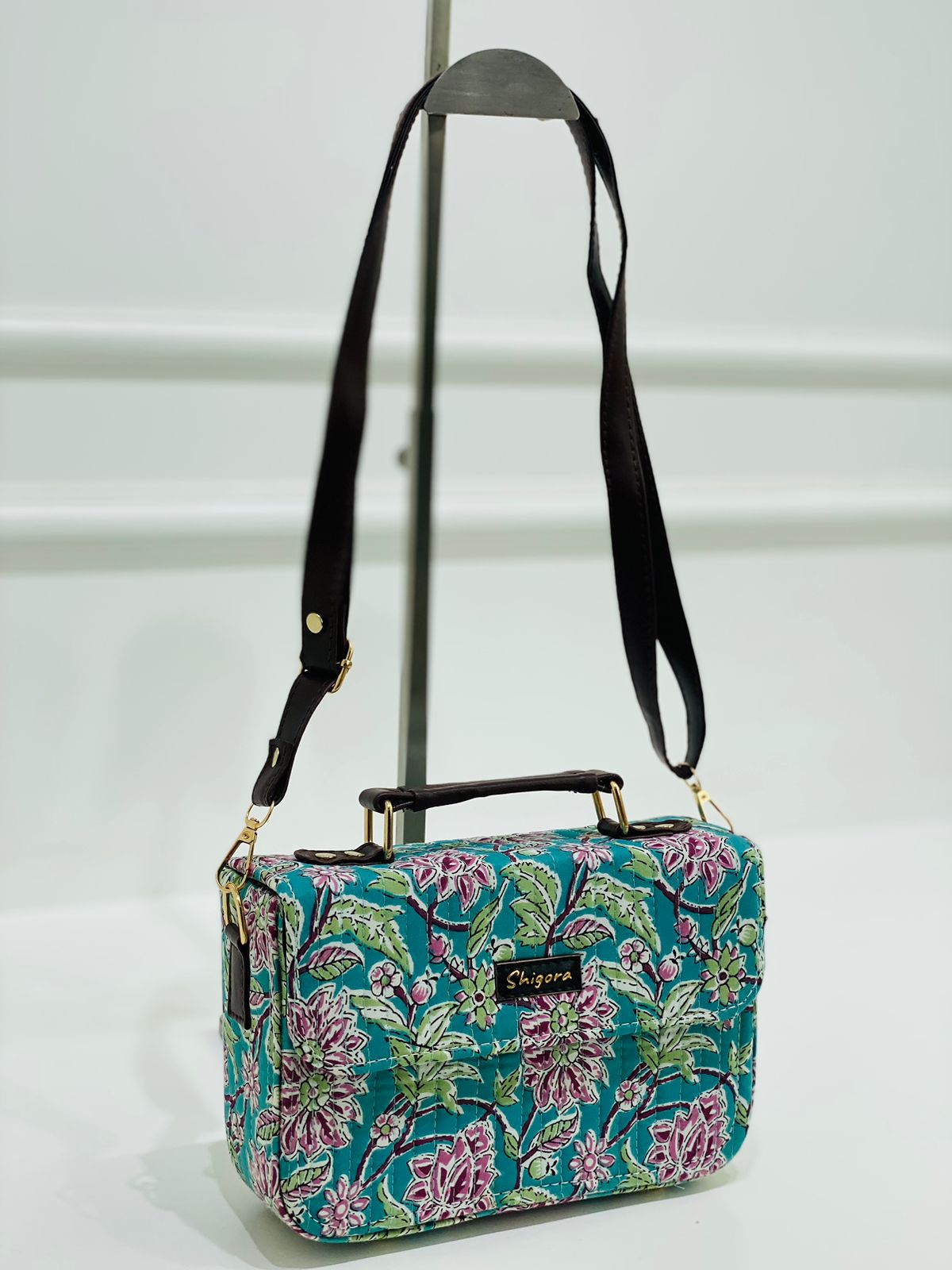 aqua floral sling bag